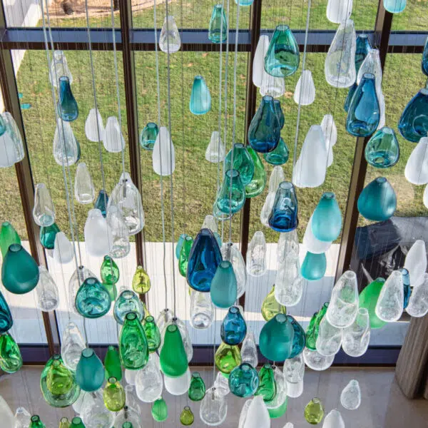 The sea, distilled into glass lighting sculpture 